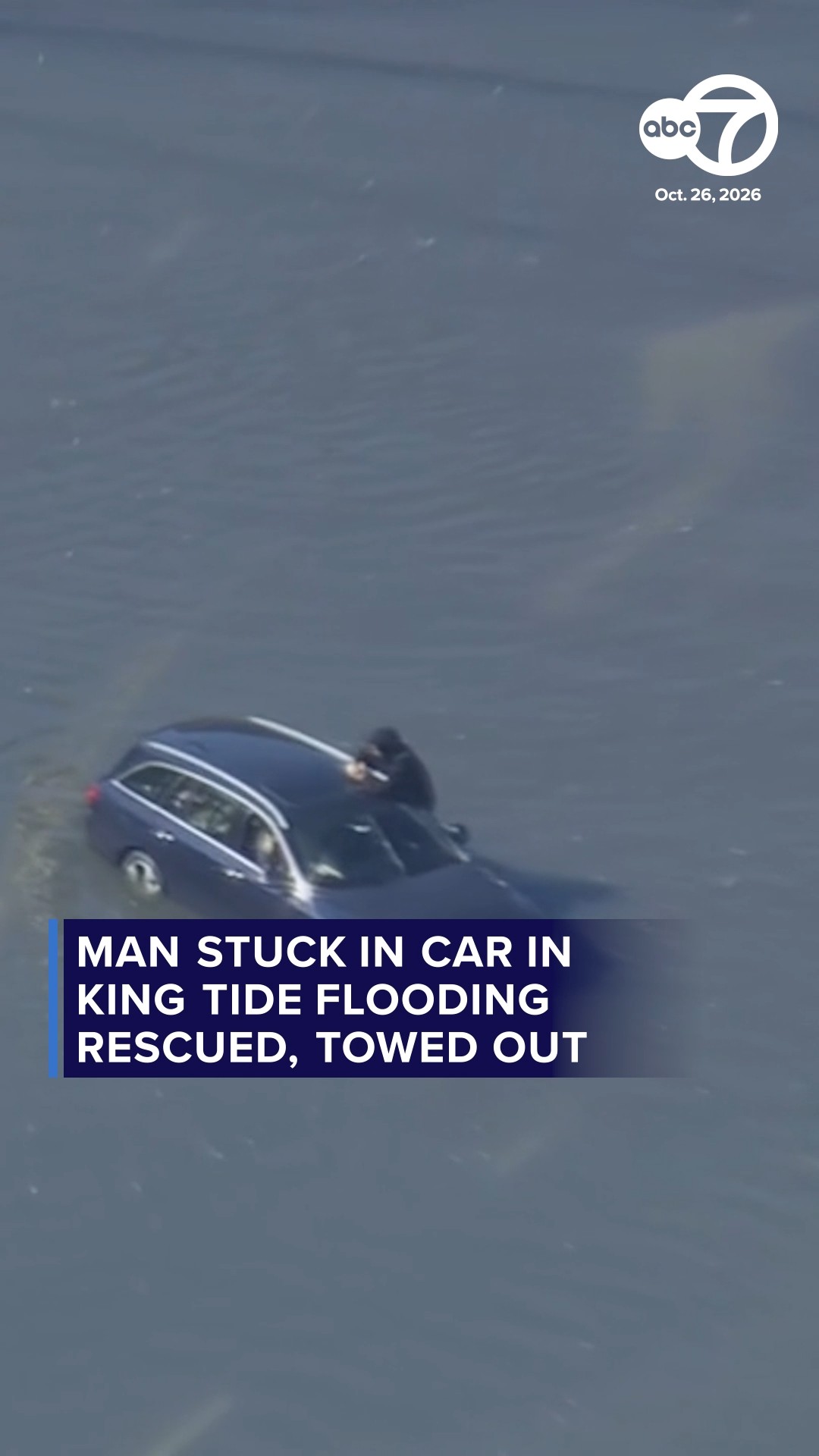 Man stuck in car in King Tide flooding rescued, towed out