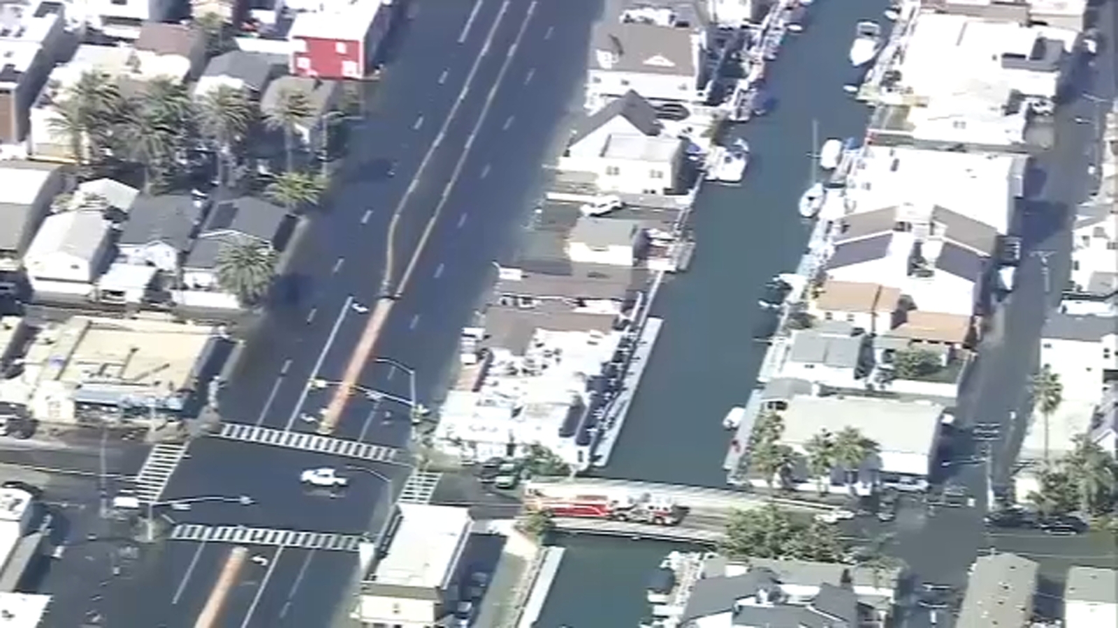 High tide floods Sunset Beach neighborhood, prompting cleanup efforts