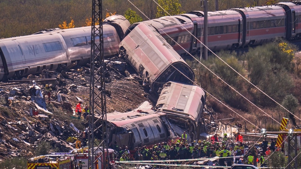 At least 64 killed in train collision on high-speed line in Spain