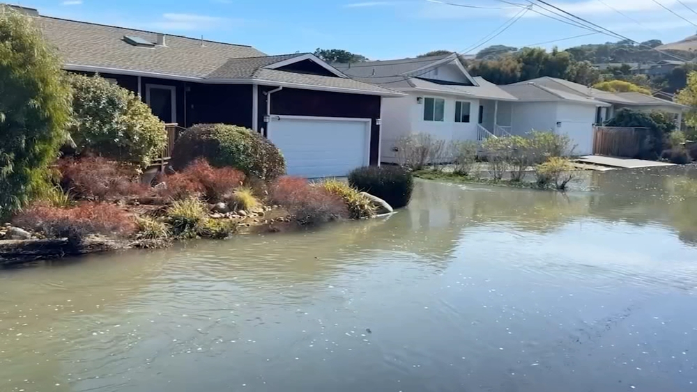High tides flood streets, yards and garages in Corte Madera