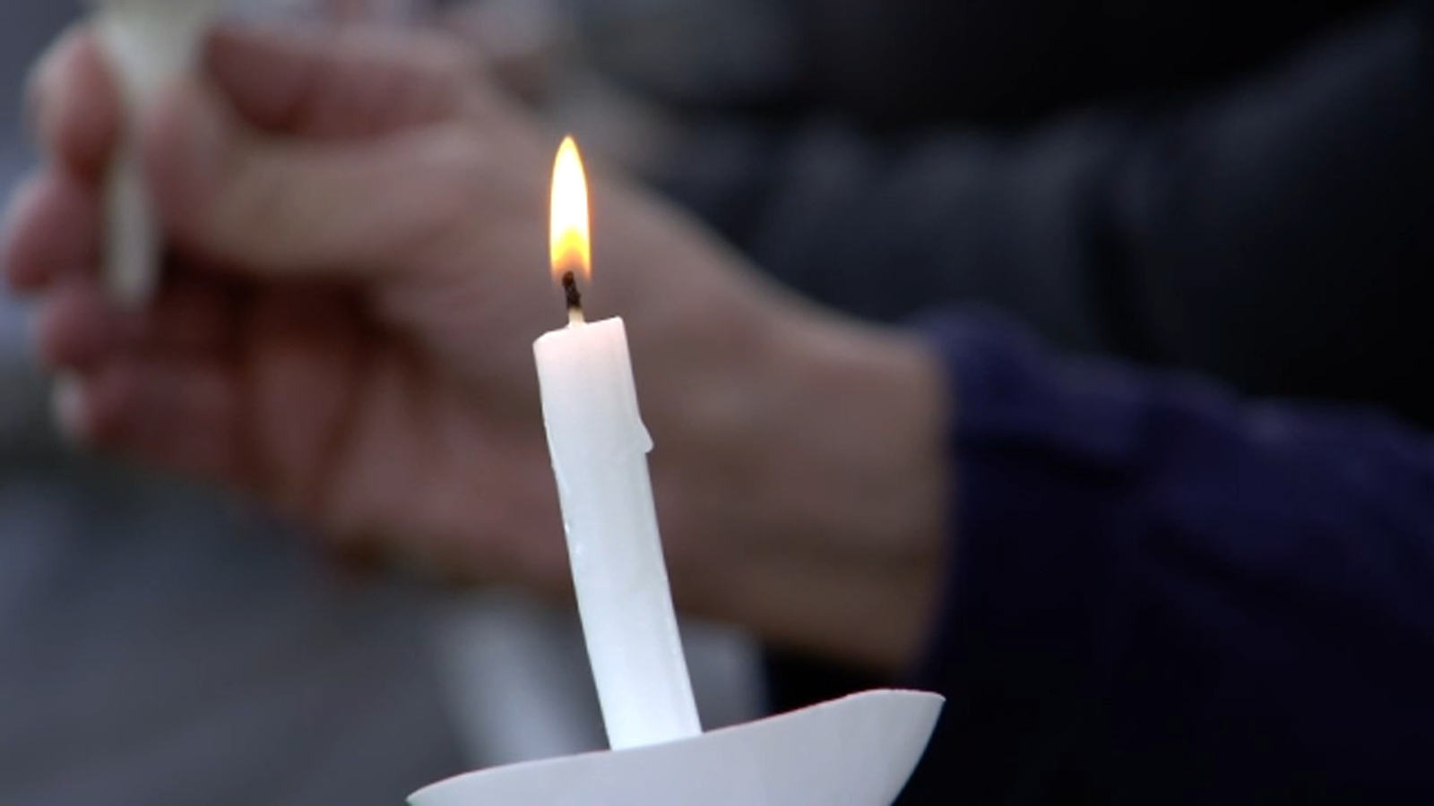 Neighbors pray for peace at vigil after Durham mother shot and killed