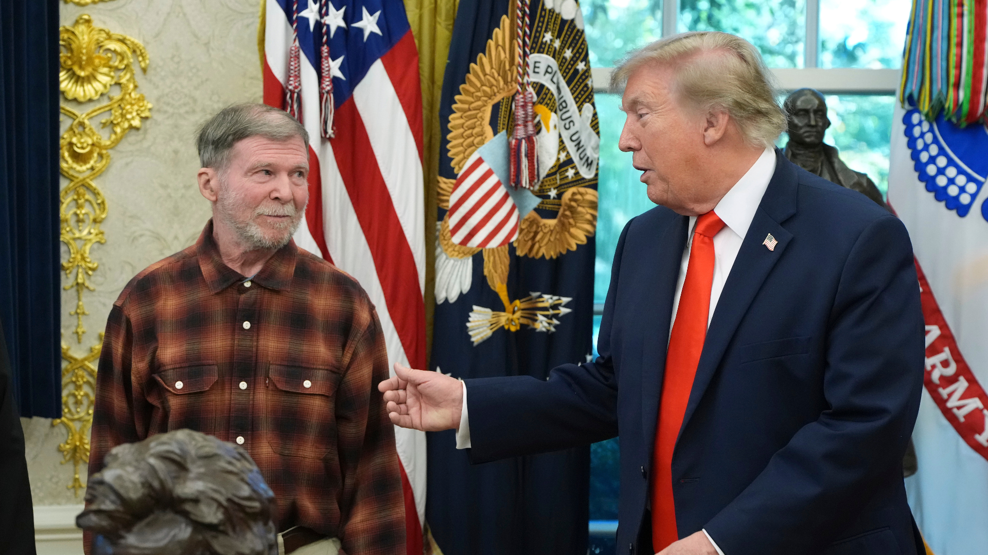 President Donald Trump, right, speaks alongside Stephen Hubbard, an American recently released after being jailed in Russia, in the Oval Office of the White House, Friday, Oct. 30, 2026, in Washington.