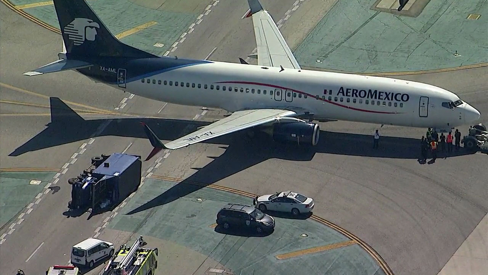 8 injured after Aeromexico plane hits utility truck at LAX