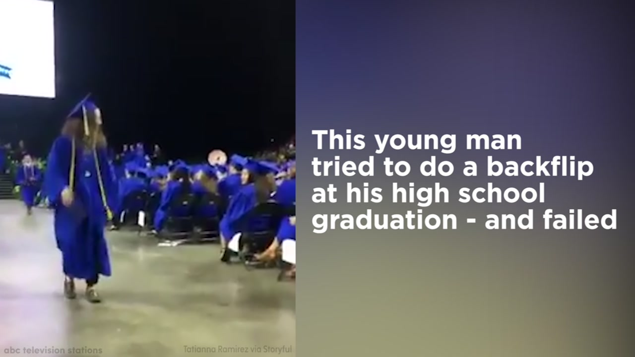 Young man fails when trying to do backflip at graduation