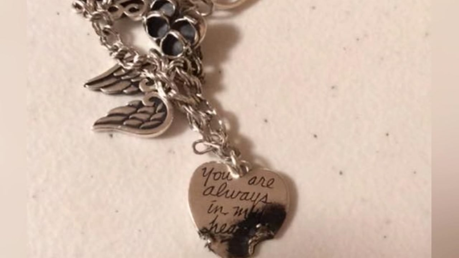 Teen shocked, burned after charm bracelet touches charger in outlet