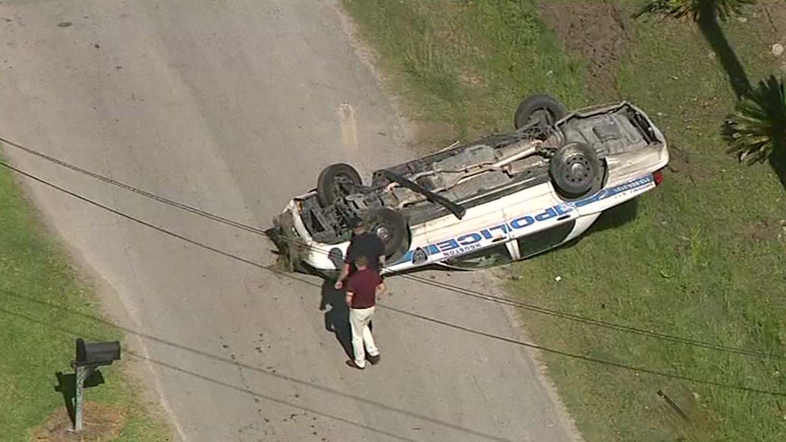 HPD police vehicle flipped by crash during chase in northeast Houston
