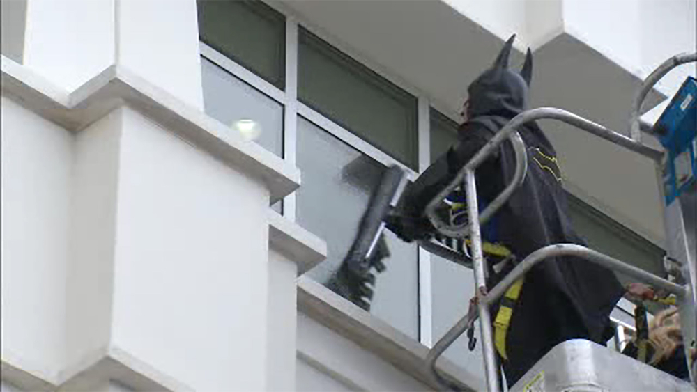 Superheroes scale Valhalla hospital walls to bring joy to kids