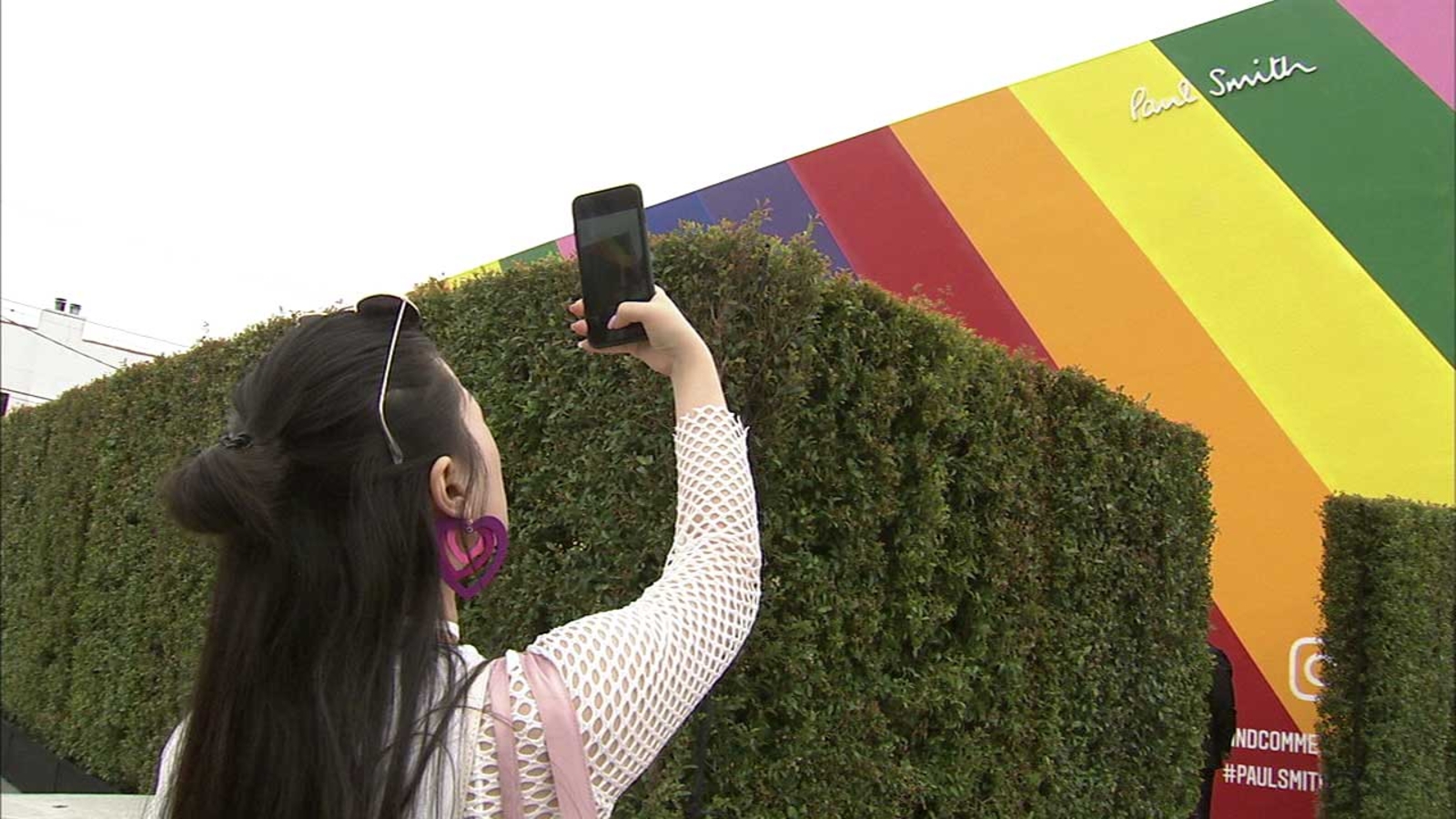 Iconic pink wall on Melrose Avenue gets rainbow makeover for Pride