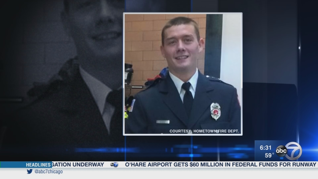 Paramedic found fatally shot in house fire