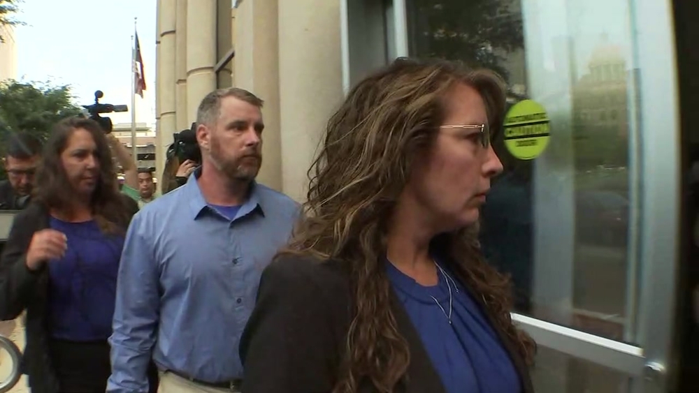 Deputy and husband seen outside courthouse