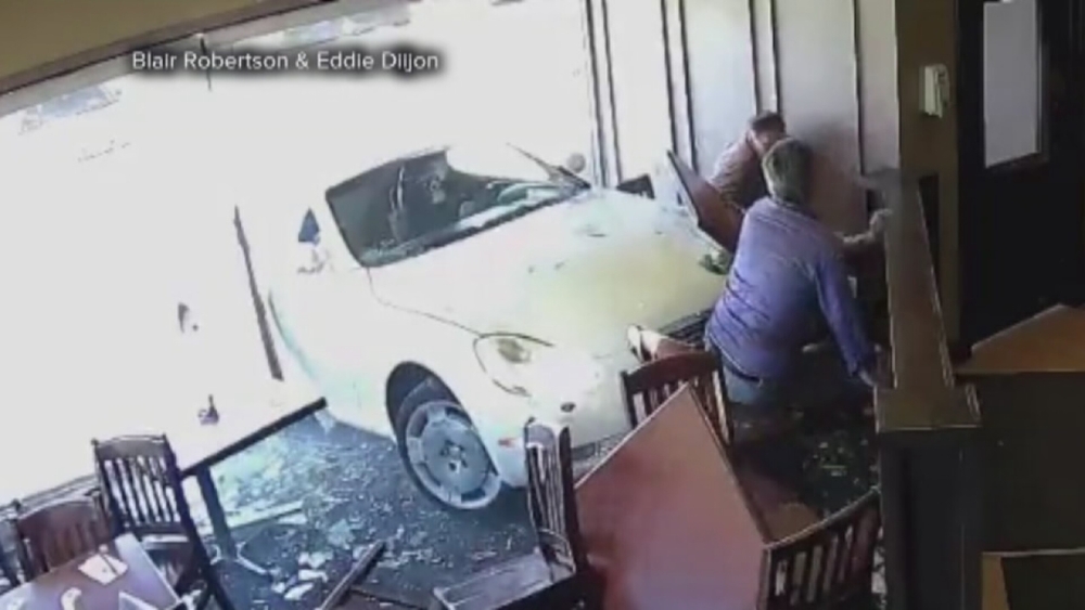 Psychic hit by car inside restaurant says he didn't see it coming