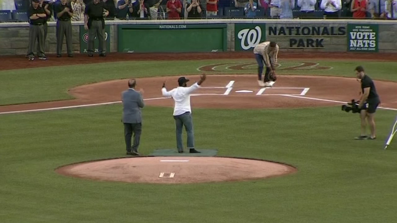 Wounded NCCU grad throws out first pitch