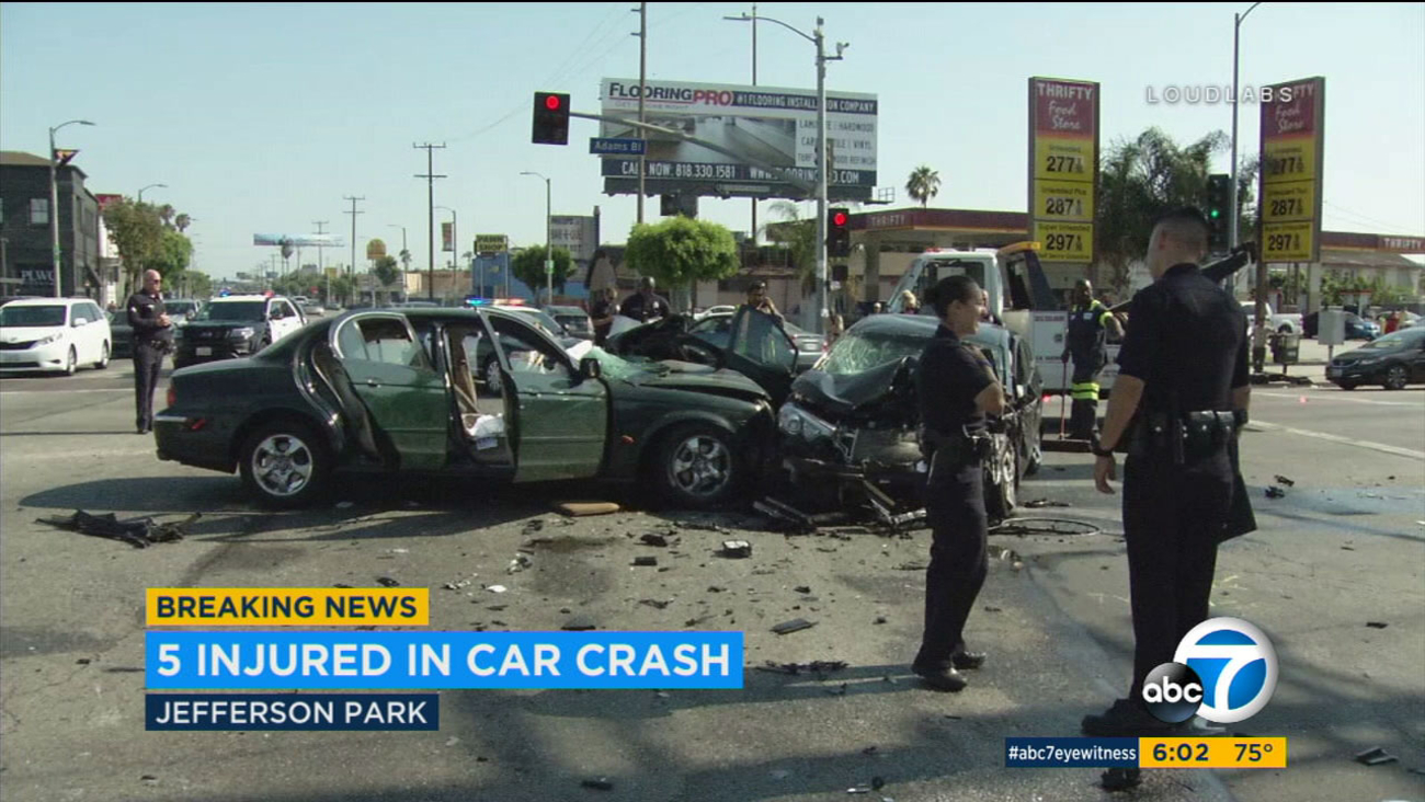 Five people were rushed to the hospital after three cars collided in a violent crash in Jefferson Park Saturday afternoon.