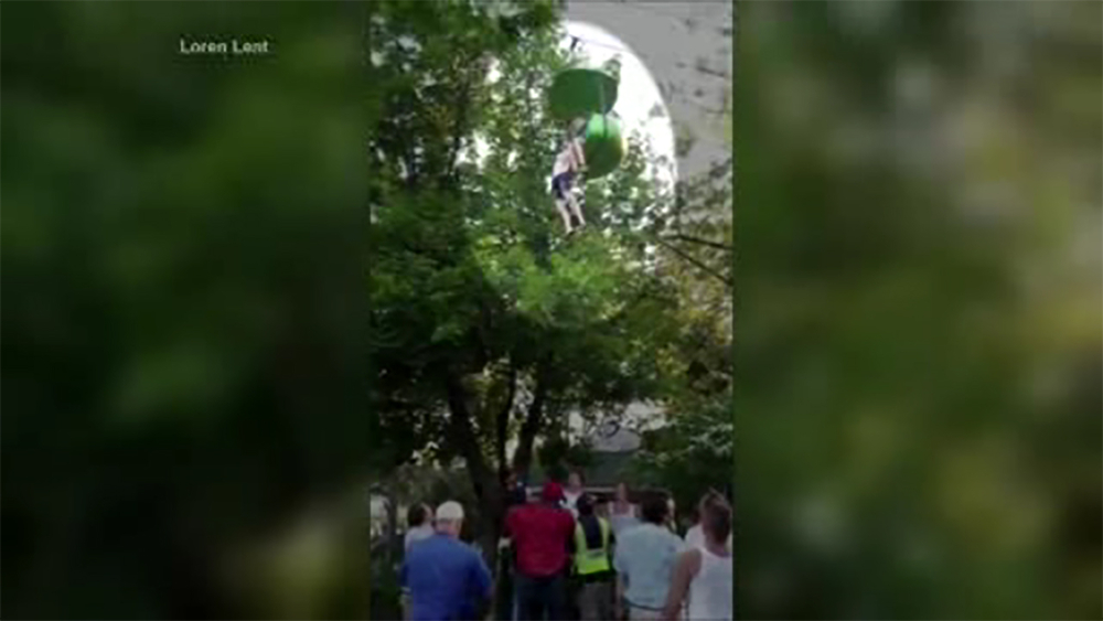 Teen caught after fall from amusement park ride