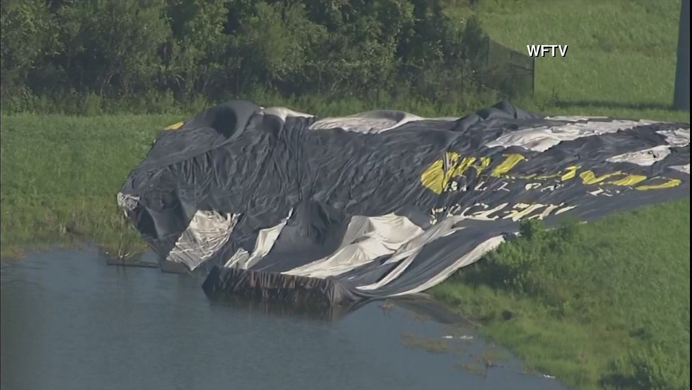 Hot air balloon crashes in alligator-infested pond near Disney World