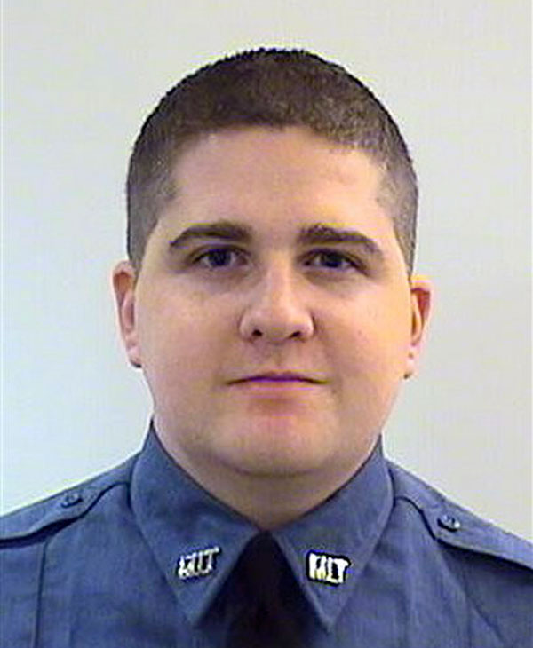 This undated photo provided by the Middlesex District Attorney's Office shows Massachusetts Institute of Technology Police Officer Sean Collier, 26, of Somerville, Mass., who was shot to death Thursday, April 18, 2013 on the school campus in Cambridge, Mass. Authorities said surveillance tape recorded late Thursday showed one of the Boston Marathon bombing suspects during a robbery of a nearby convenience store before Collier was shot to death while responding to a report of a disturbance.