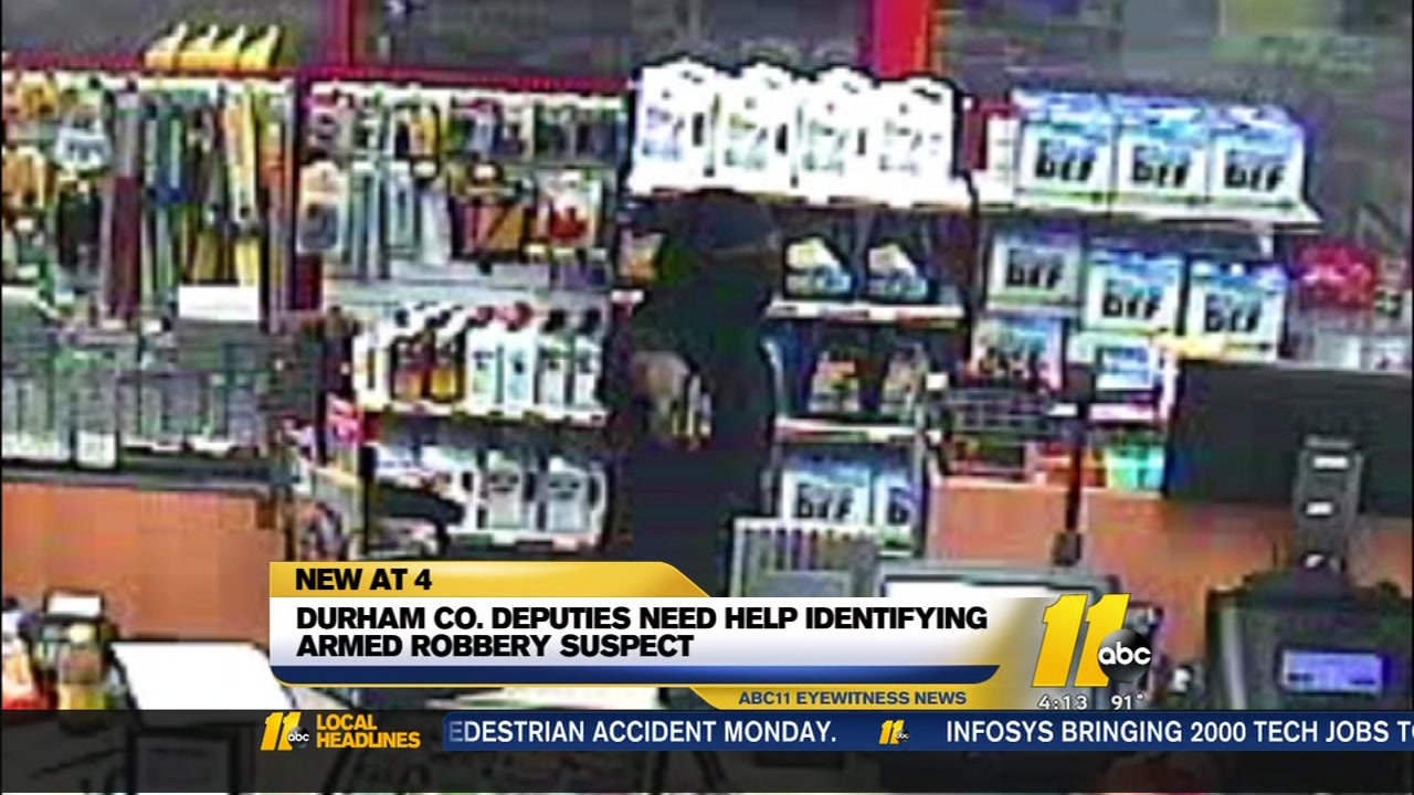 Surveillance photos of armed robbery suspect released