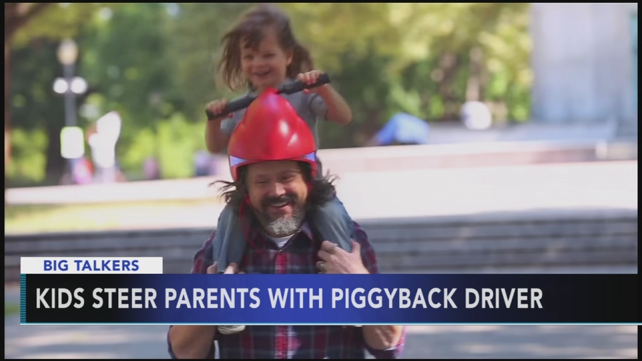Smart helmet with handlebars lets kids steer parents