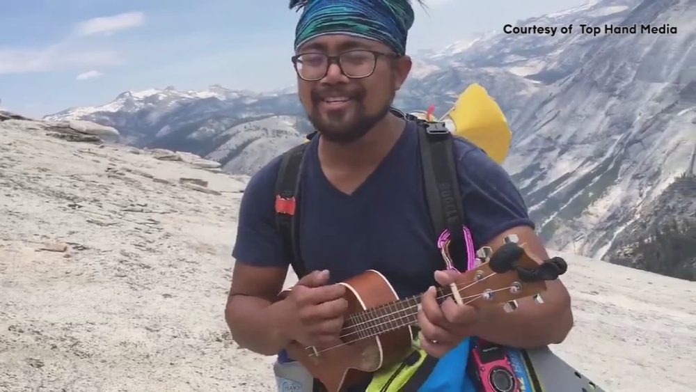 Hikers on Half Dome encounter a musical treat on the way back down