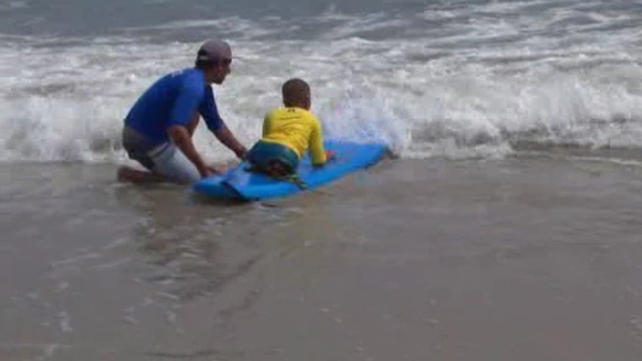 People with disabilities take to the waves with 'Surf for All' on Long Island