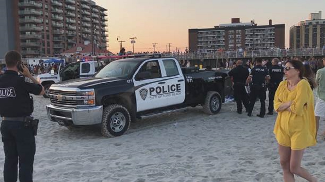 Police vehicle hits 2 people lying on Long Island beach