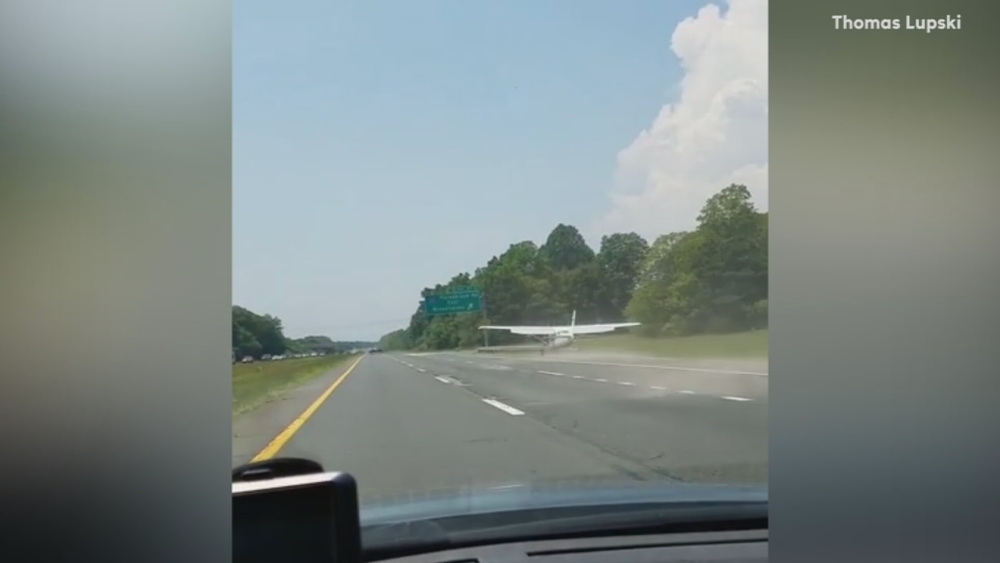 Raw video: Plane lands on highway