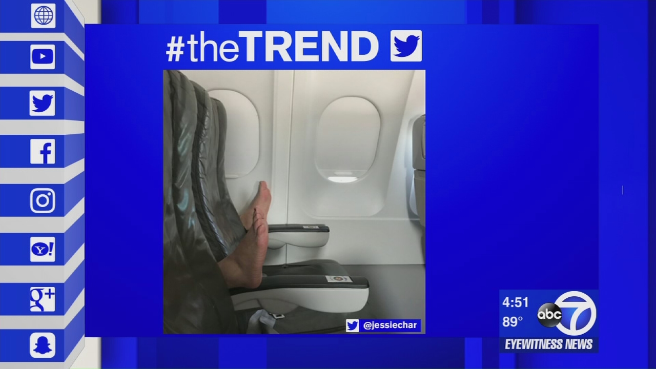 The Trend: Airline passenger plants bare feet on arm rests during flight