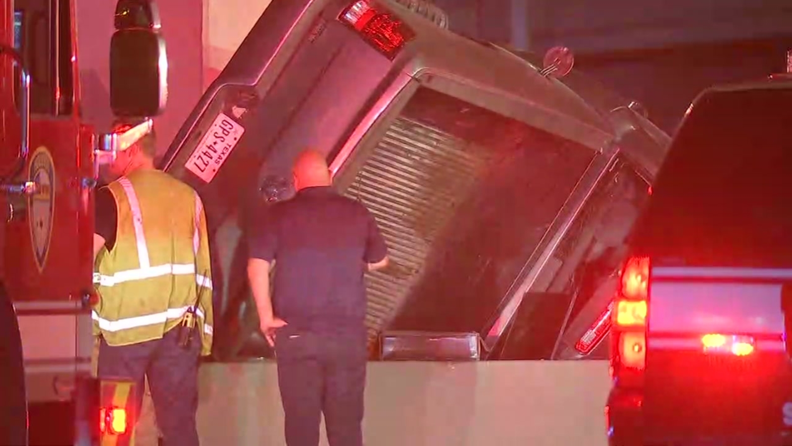 Truck flips on side over wall under HOV overpass on Hwy 59 and
