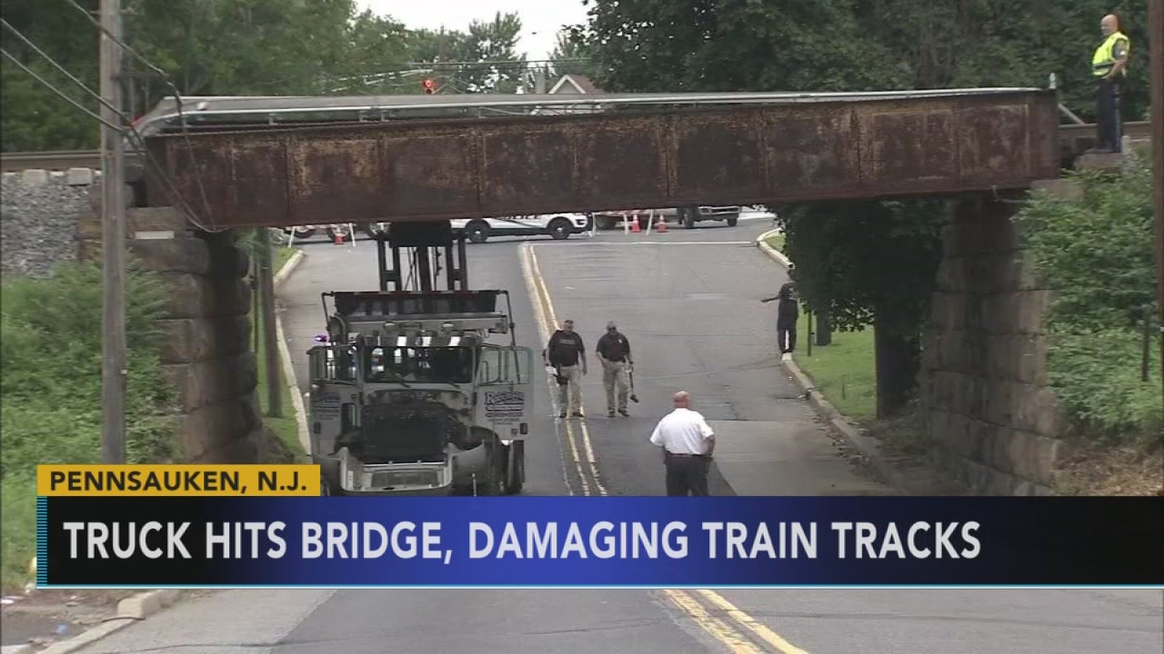 Boom truck damages bridge on NJ Transit AC rail line