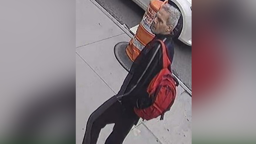 New photos of suspect in ATM acid threats