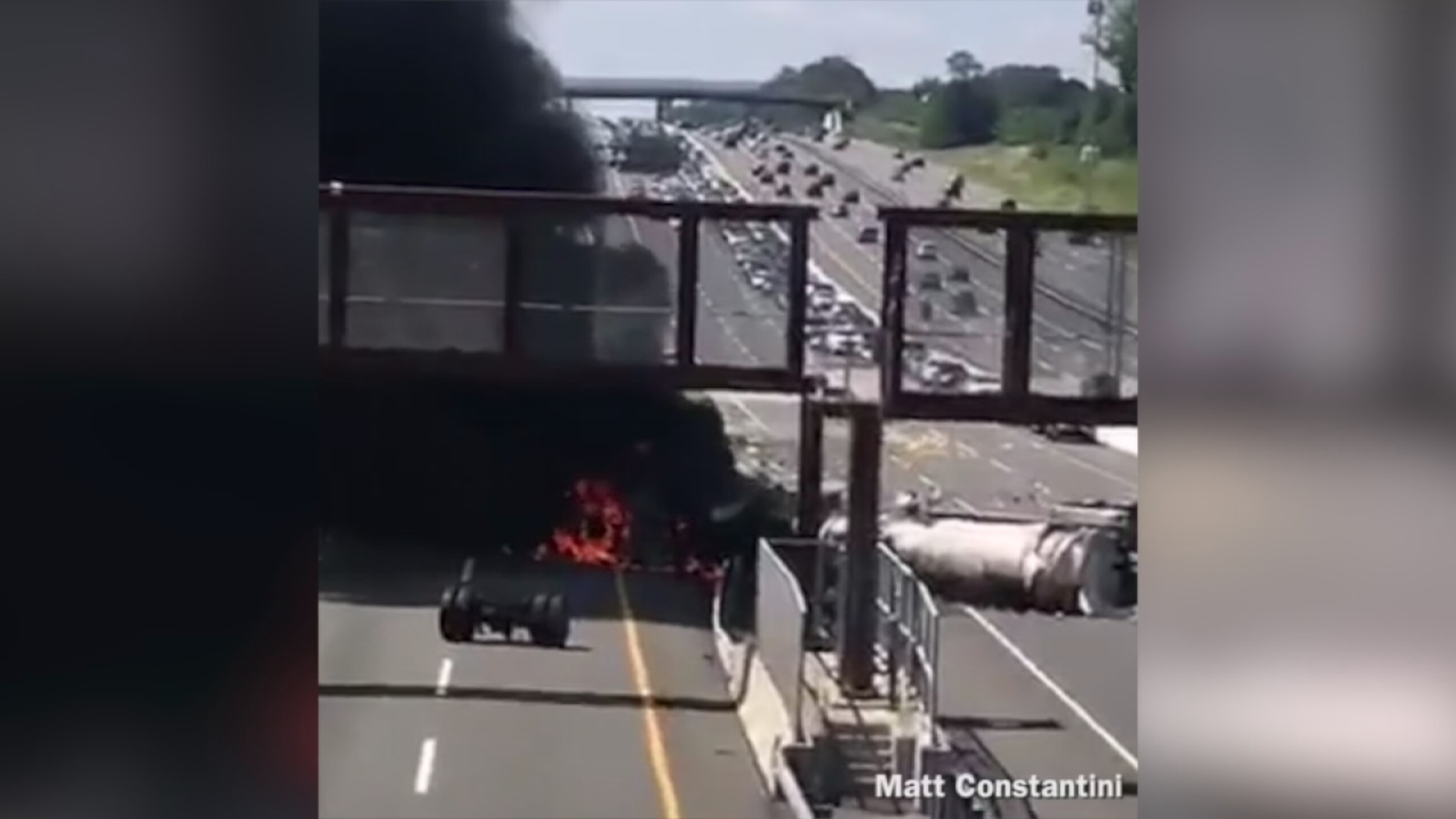 Overturned oil tanker catches fire, leaves New Jersey Turnpike in