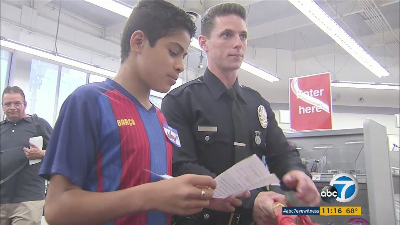 LAPD officers escort children shopping for school supplies