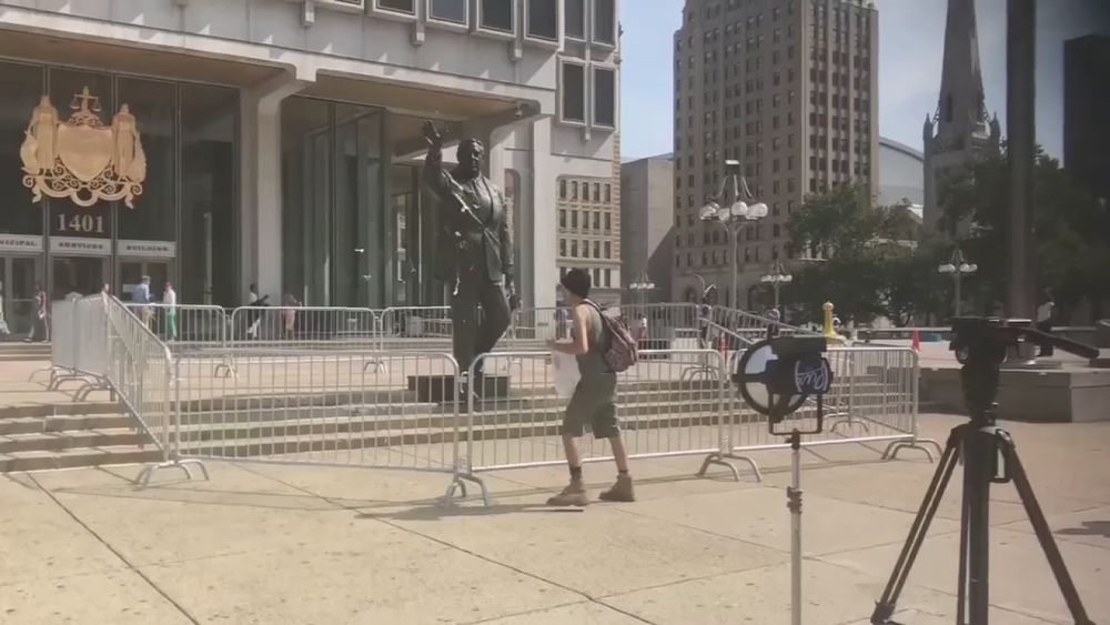Man throws egg at Frank Rizzo statue