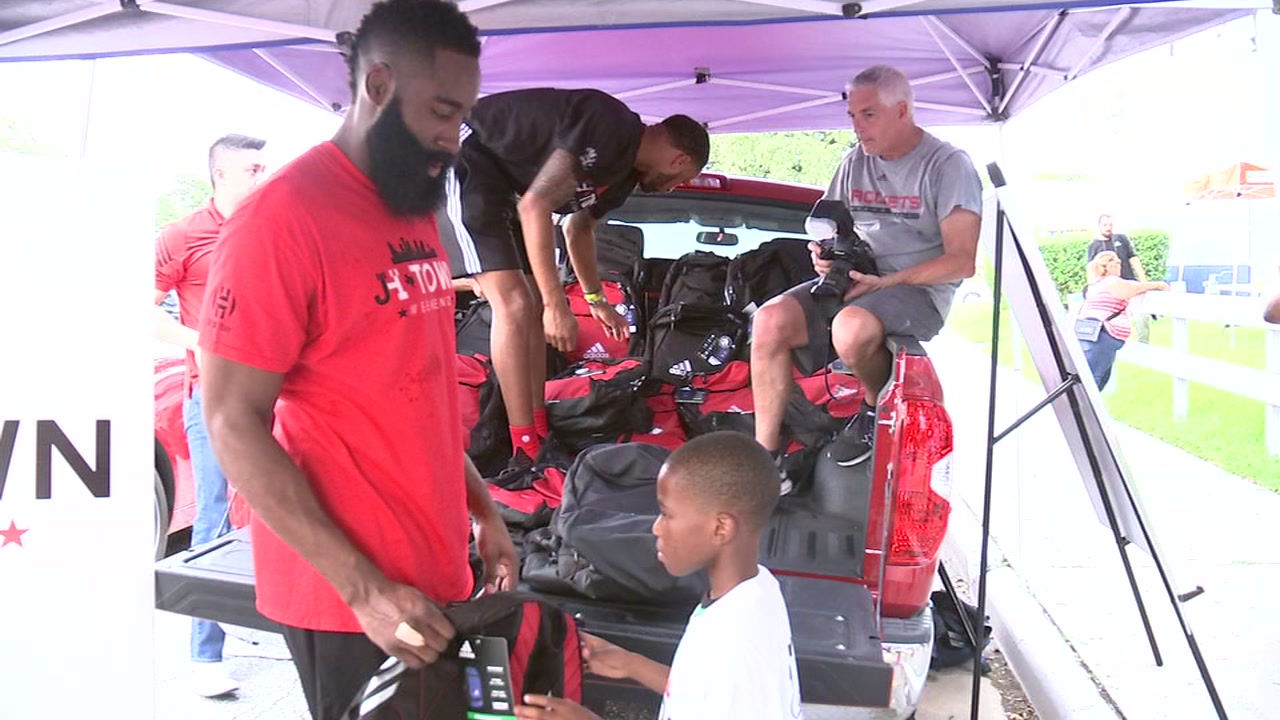 James Harden gives out school supplies to kids in Houston
