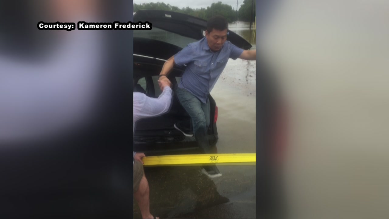 Man rescued after driving into floodwaters off Barker Cypress
