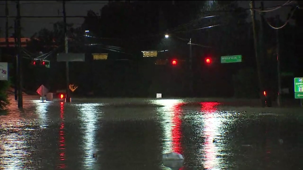 Car completely submerged near White Oak Bayou