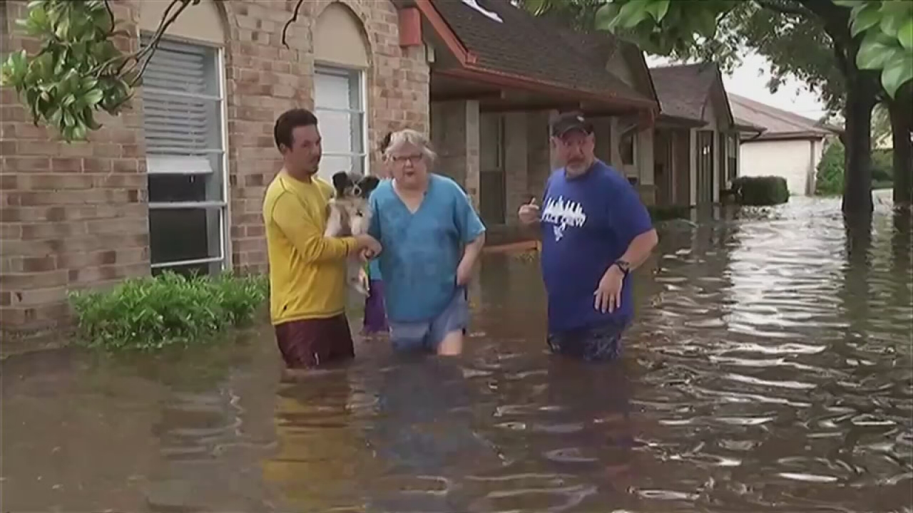 Rescuers pluck hundreds from rising floodwaters in Houston
