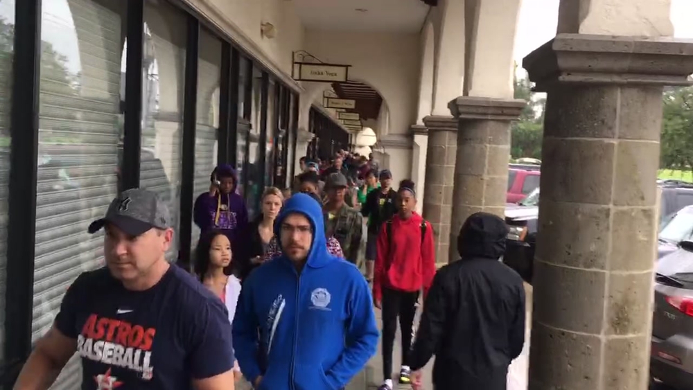 Line for groceries wraps around Kroger building