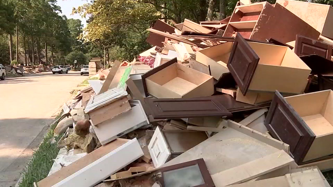 Mountains of debris plagues Kingwood neighborhood