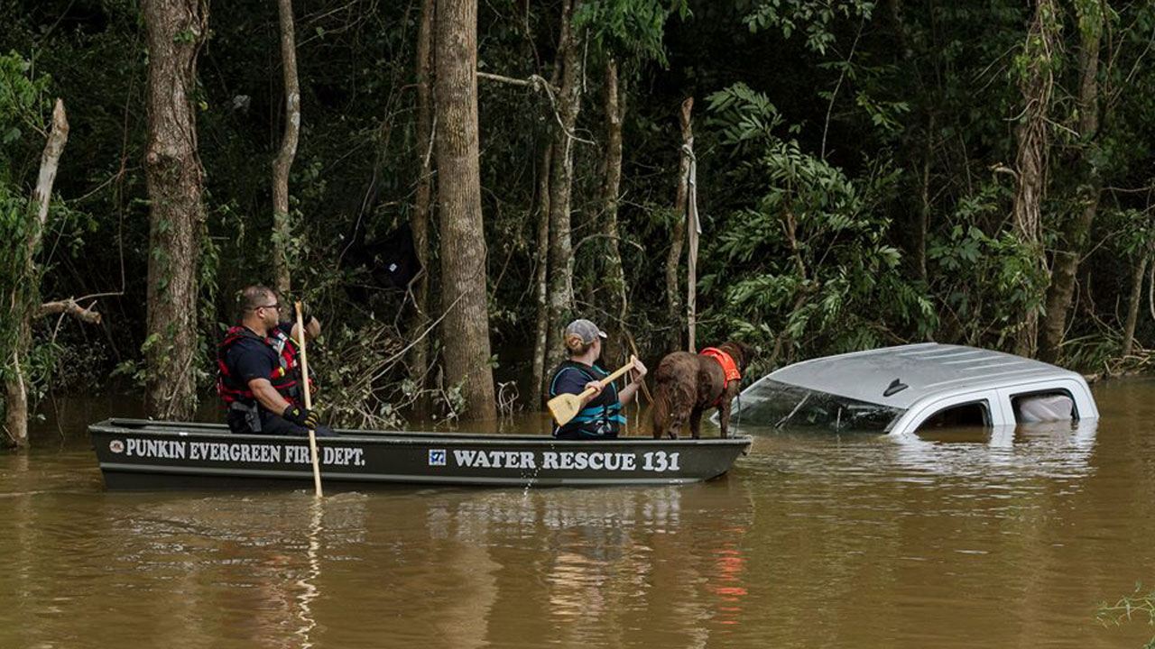 Body of baby found after being snatched by floodwaters