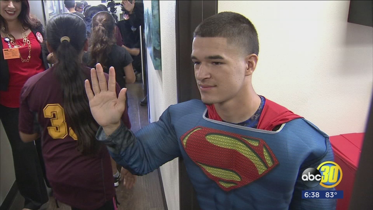 Parlier elementary students greeted by super heroes at school to combat chronic absenteeism