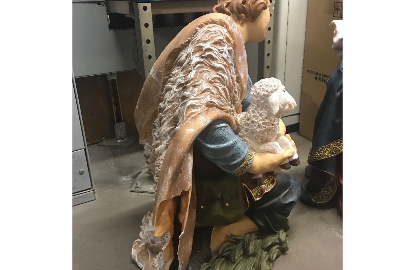 Basement broken into, nativity scene statues broken.