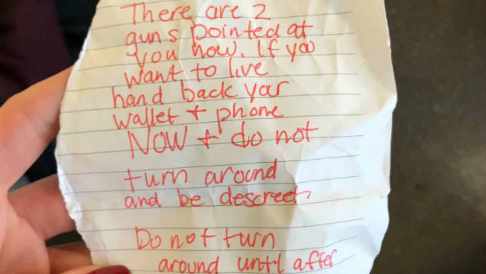 BART investigating after woman says someone tried to rob her with note