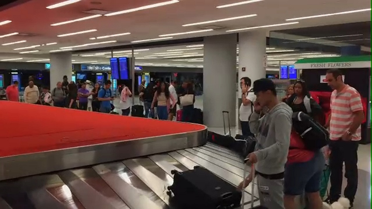 Passengers return home from Puerto Rico before Hurricane Maria