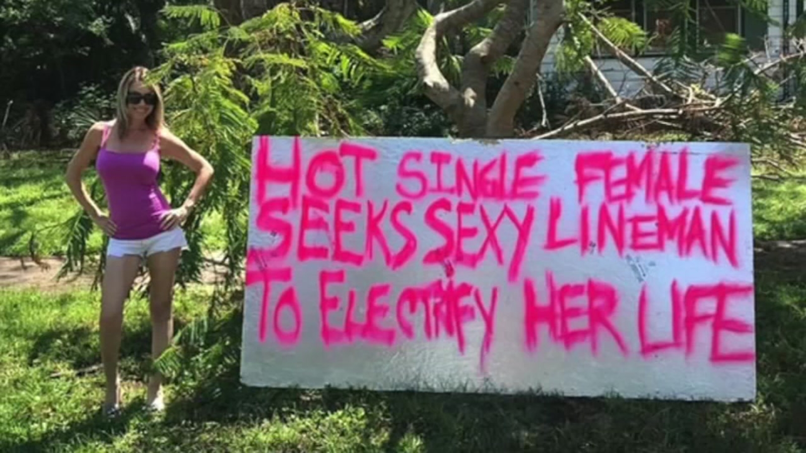 Woman makes 'single and sexy' sign to get power back on after Hurricane