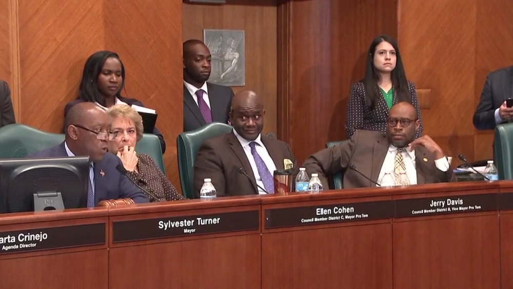 Larry Green and Mayor Turner engaged in heated discussion