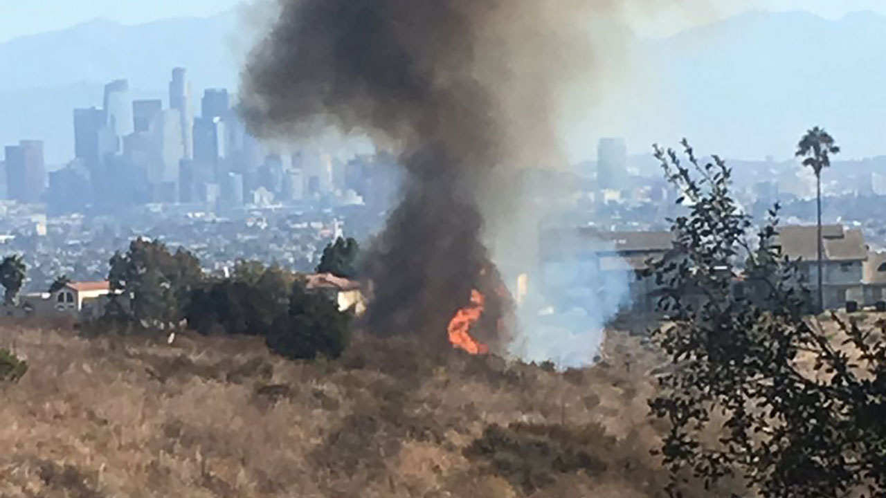 Flames from a brush fire burning at the Kenneth Hahn State Recreation Area near Baldwin Hills on Sunday, Sept. 24, 2017.