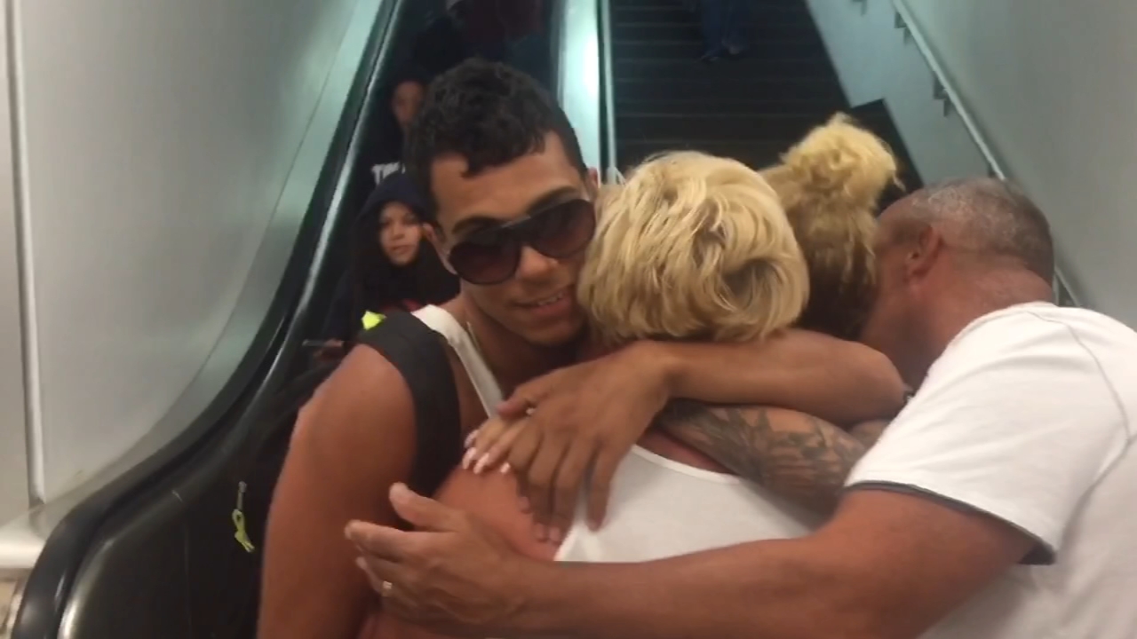 Emotional reunions after first plane to NYC from Puerto Rico arrives