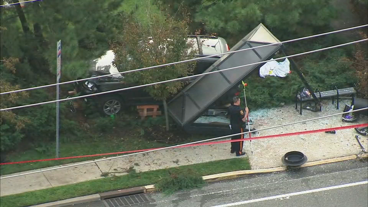 Woman killed when SUV crashes through NJ bus stop