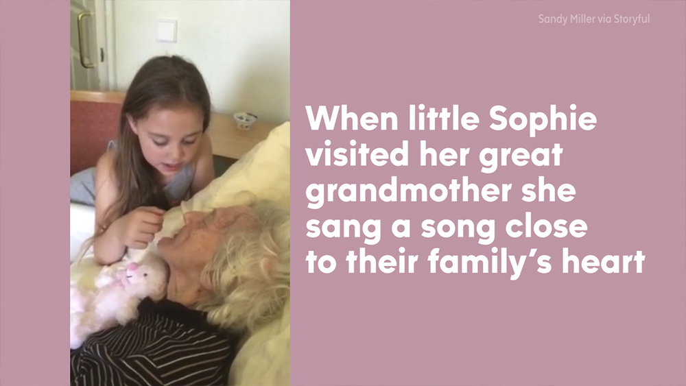 Girl sings to grandmother with dementia.